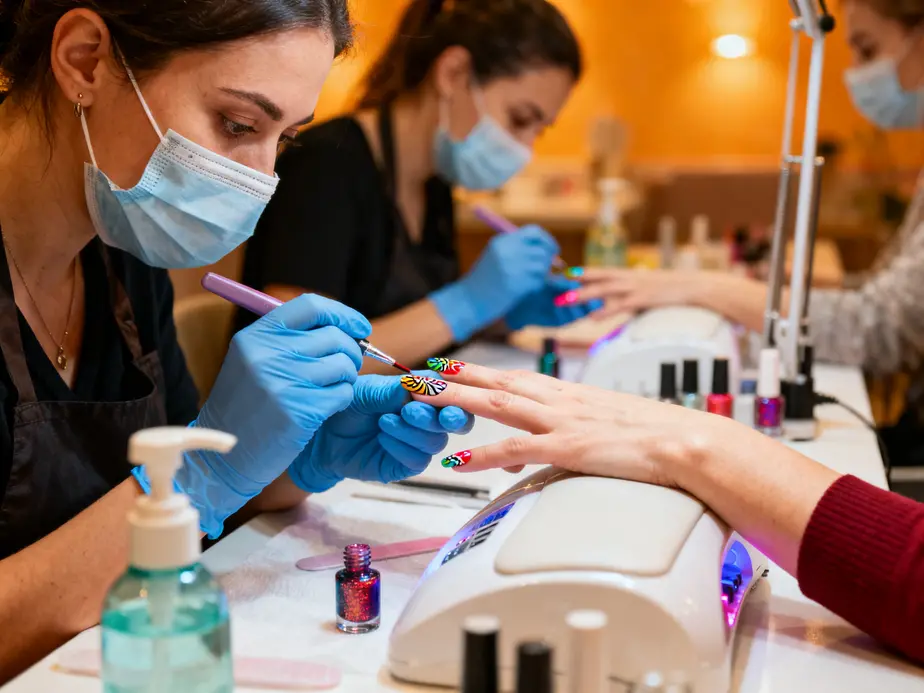A vibrant nail salon demonstrating professional practices with a focus on health safety.